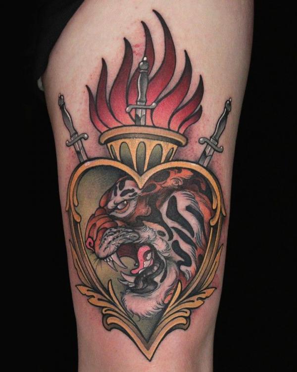 Sacred heart and tiger head tattoo