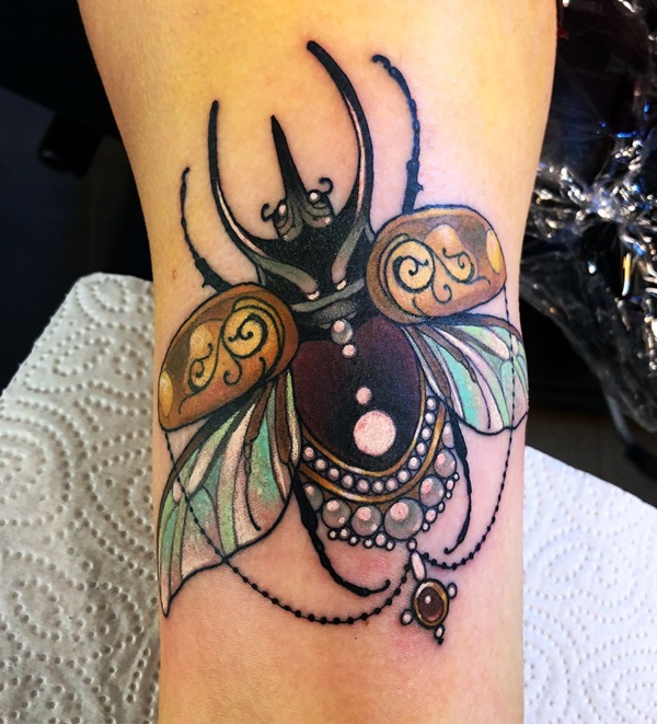 Scarab amulet tattoo
