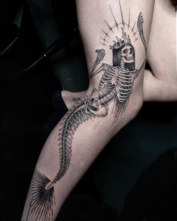 Skeleton mermaid leg tattoo