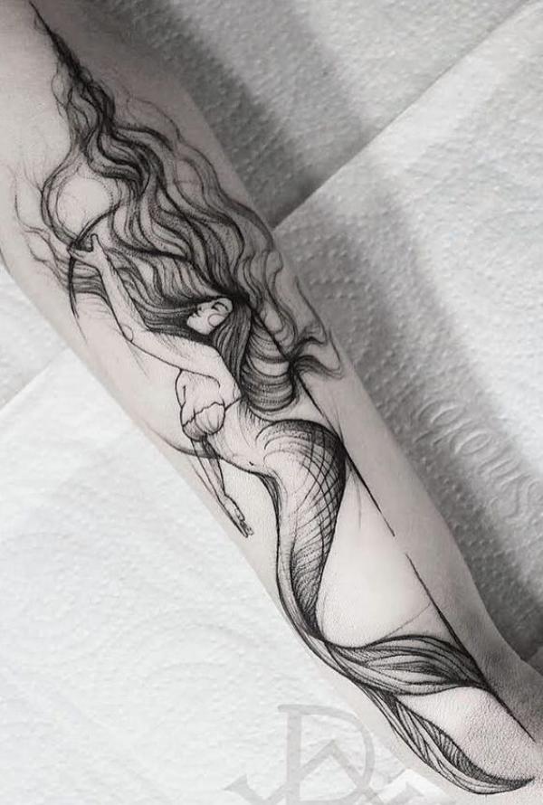Sketchy mermaid forearm tattoo