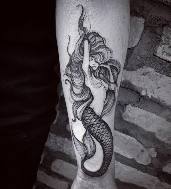 Sketchy mermaid tattoo forearm