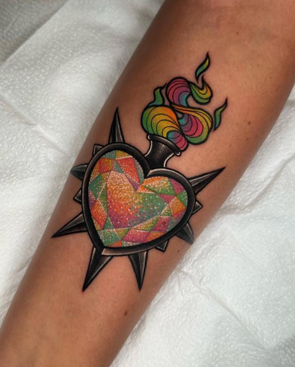 Stylized sacred heart with colorful flame
