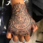 Sun of God Hand tattoo