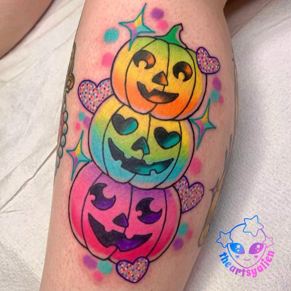 Three colorful pumpkins