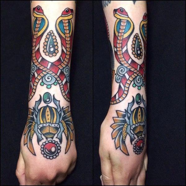 Traditional Scarab Beetle and cobra tattoo