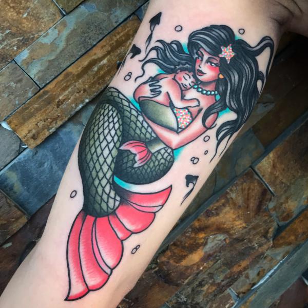 Traditional mermaid and baby tattoo
