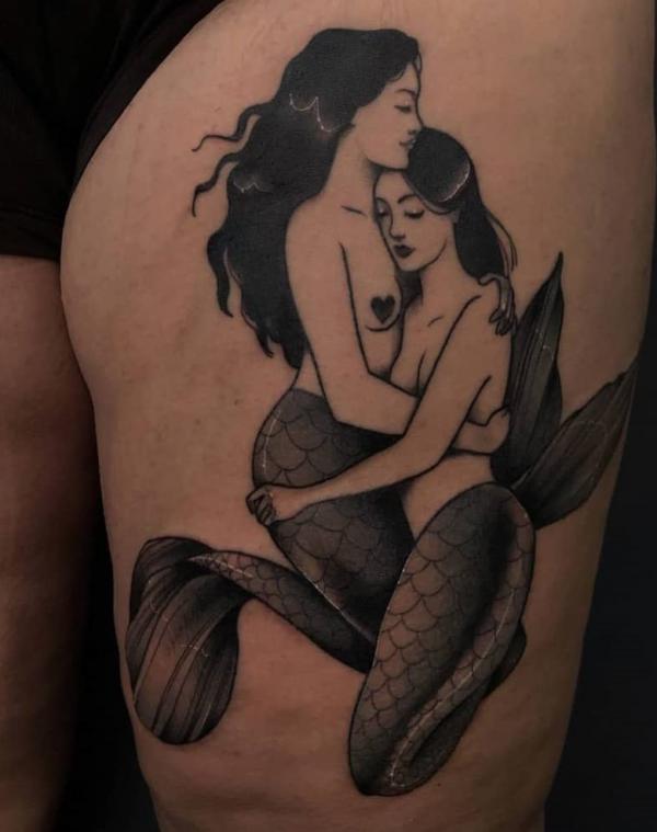 Two mermaids tattoo