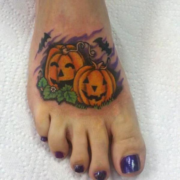 Two pumpkin foot tattoo