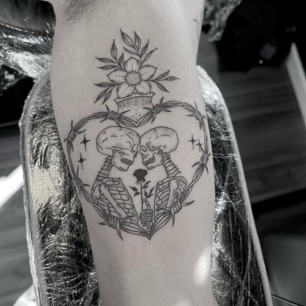 Two skeletons in the throned sacred heart