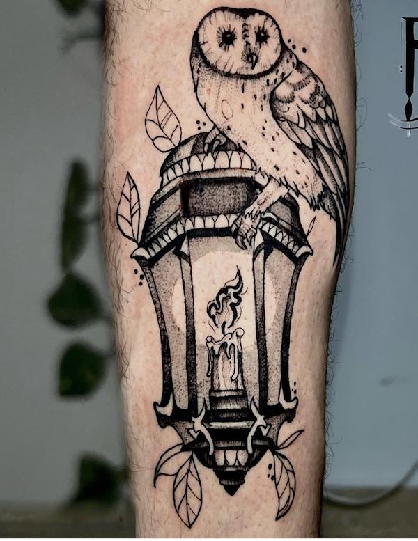 Victorian owl perched on lamp