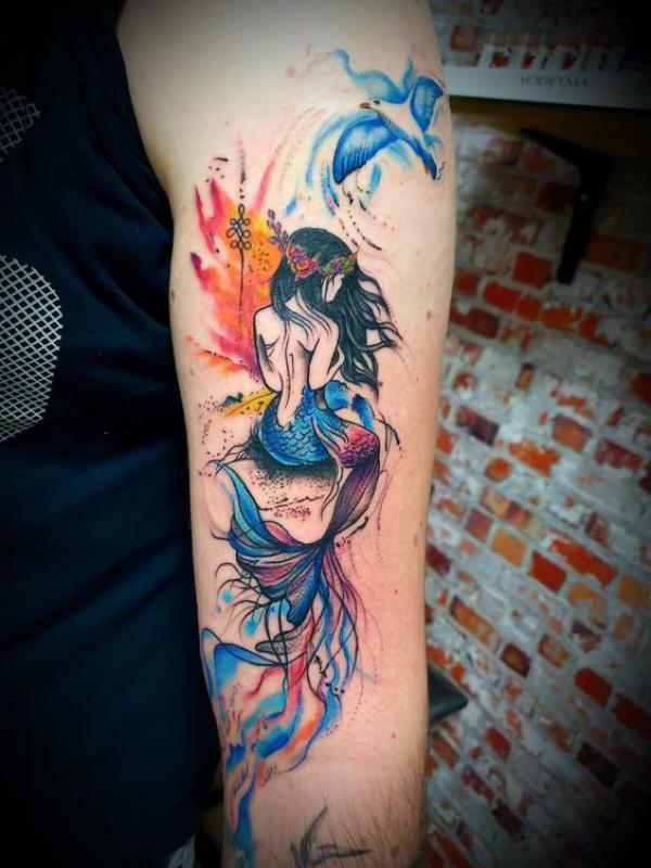 Watercolor mermaid and bird tattoo
