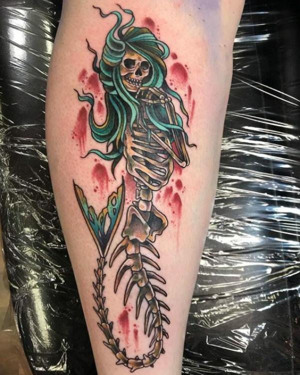 Watercolor skeleton mermaid forearm tattoo