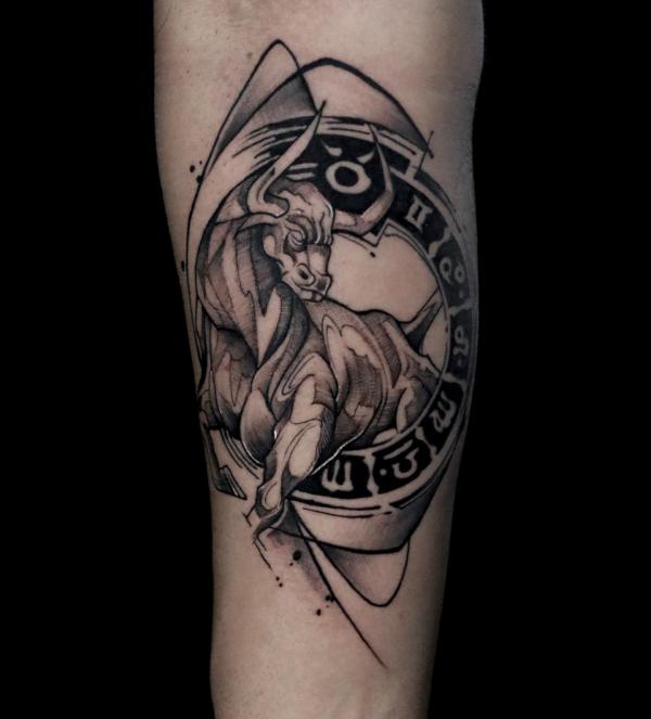 A bull pass through a Zodiac wheel