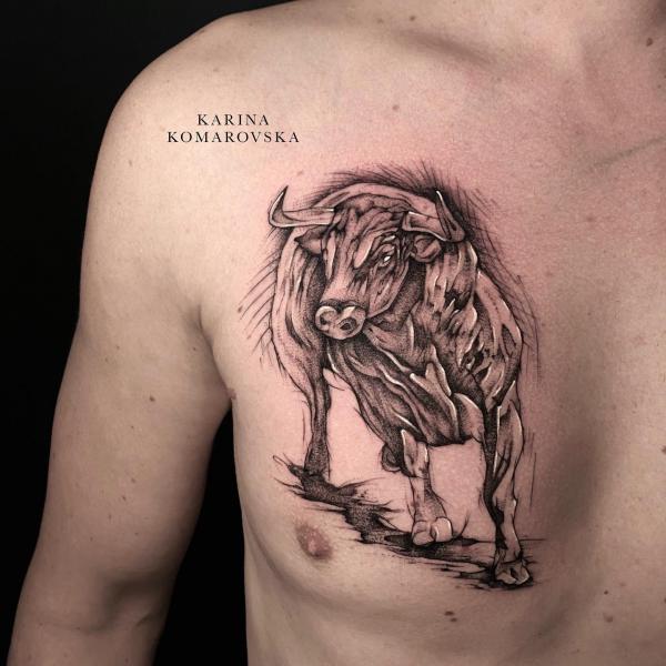 A lonely bull chest tattoo