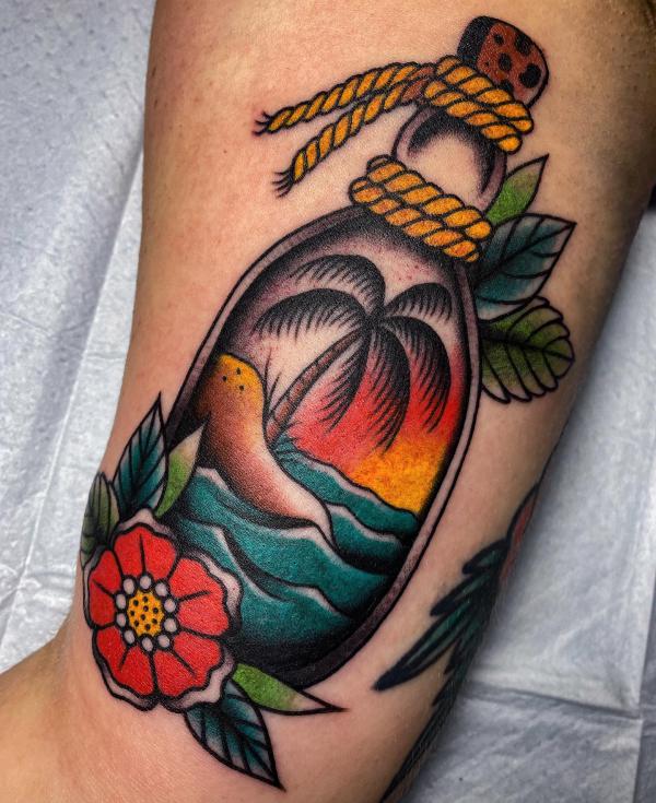 A serene seascape with palm tree sealed in a bottle