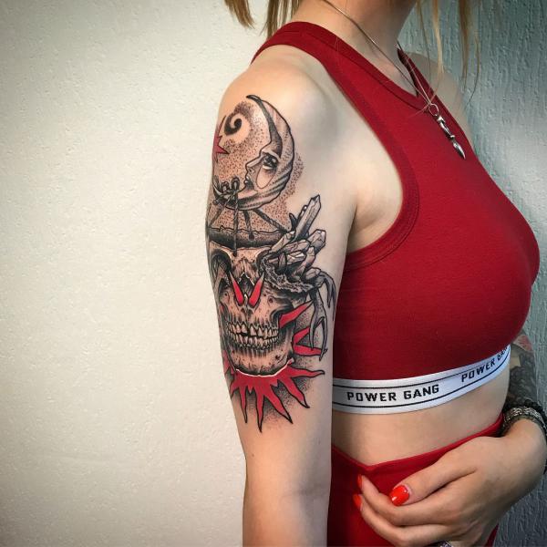 A skull hang on crescent moon face