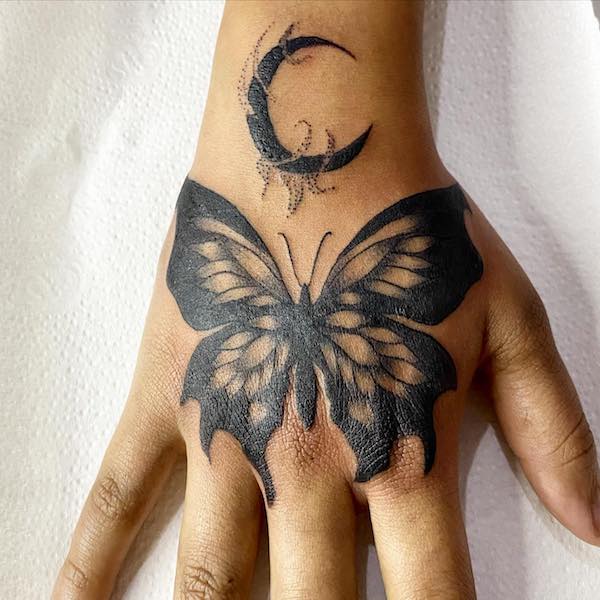 Black crescent moon and butterfly