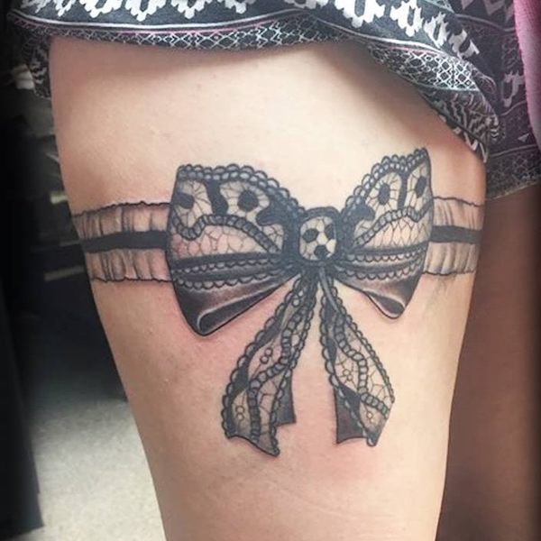 Black garter tattoo