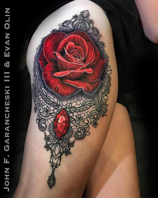 Black lace and red rose with jewelry