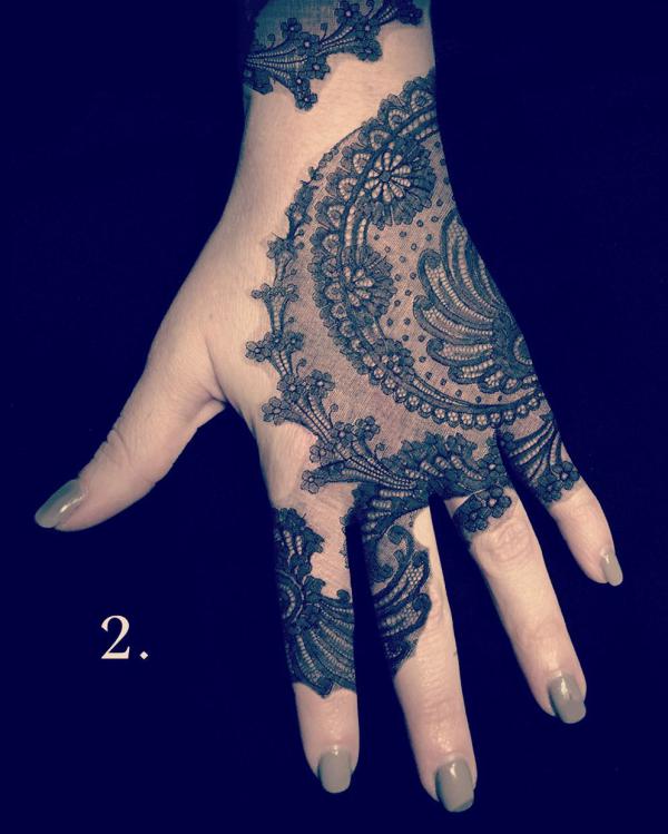 Black lace hand tattoo
