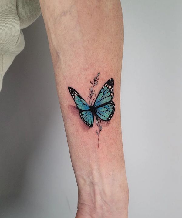 Blue butterfly tattoo men