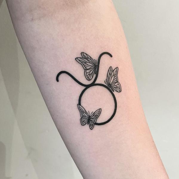 Butterfly perched on Taurus Glyph