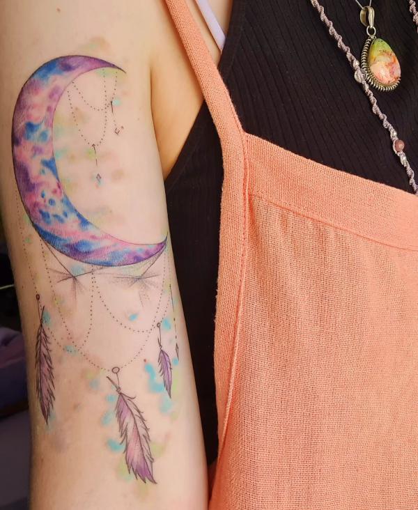 Cloudy crescent moon with feather pendant