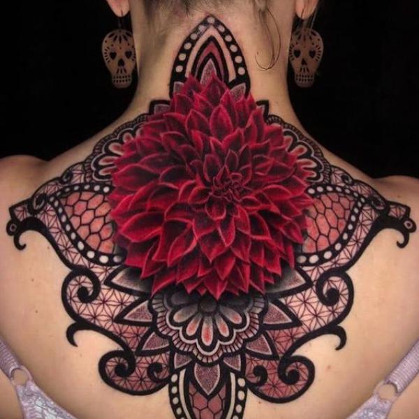 Dahlia and lace tattoo on the back of neck and back