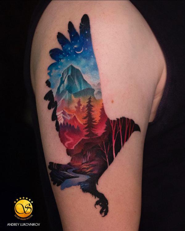 Falling eagle with nighty landscape background