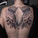 Goat Skull immersed in chrysanthemums