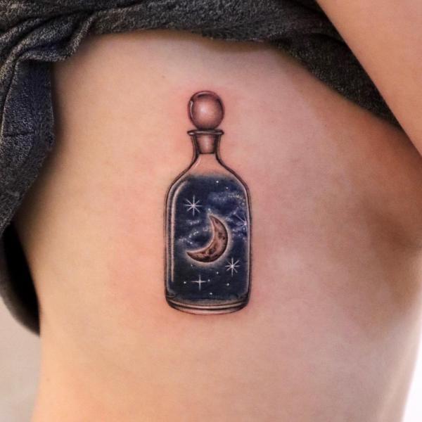 Magic bottle with galaxy moon and stars