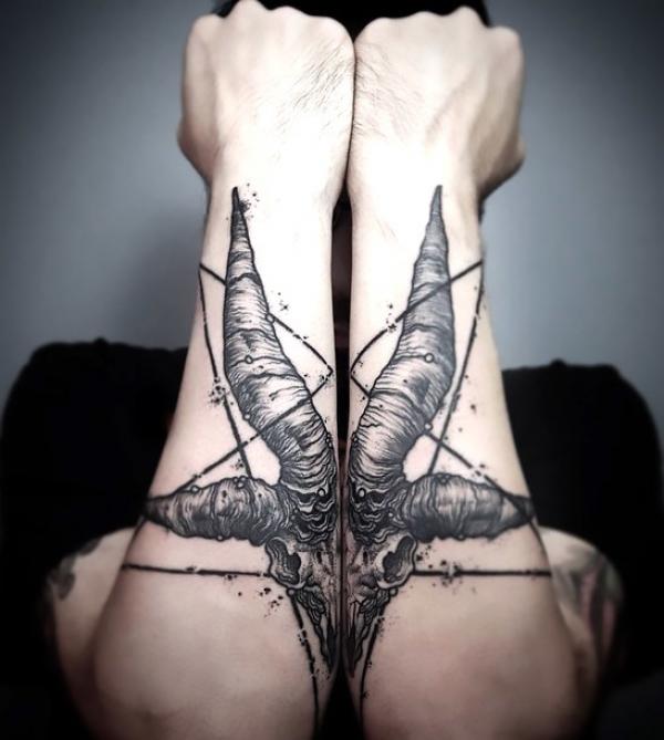 Matching goat skull forearm tattoo