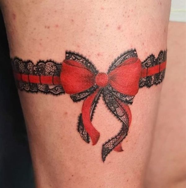 black lace bow tattoo