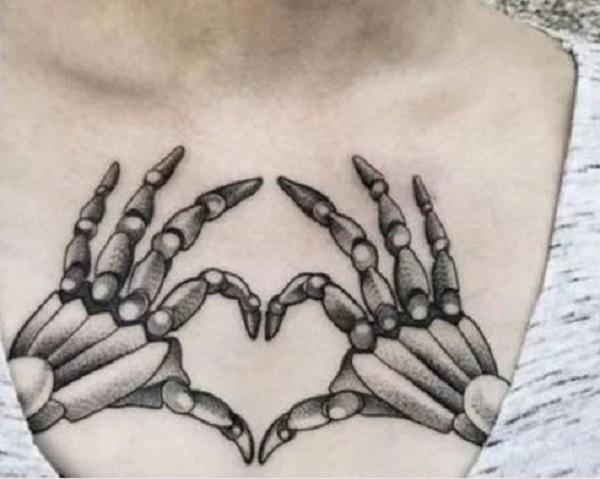 Skeleton hands forming a heart