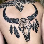Thunderbird and Bull skull with feathers