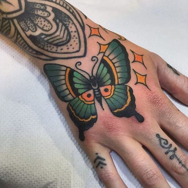 Traditional hand tattoos for men butterfly