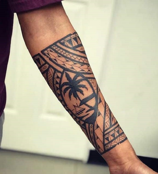 Tribal forearm tattoo with Palm tree
