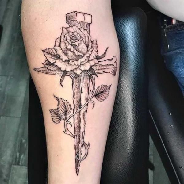 Wooden cross dagger with rose