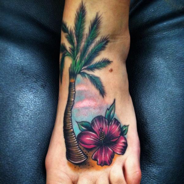 hibiscus flower and palm tree foot tattoo