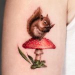 A realistic squirrel on a mushroom