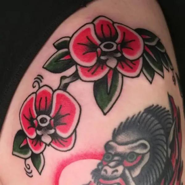 American traditional orchid and gorilla tattoo