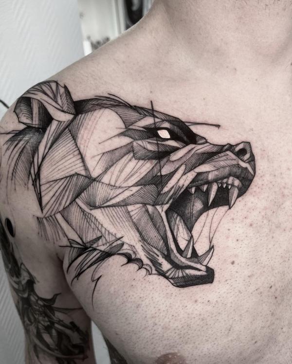 Angry roaring grizzly bear chest tattoo