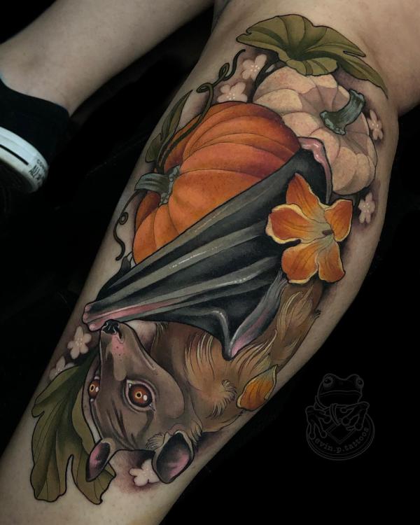 Bat and pumpkin calf tattoo