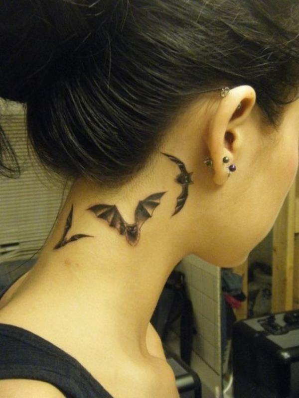 Bats tattoo behind the ear