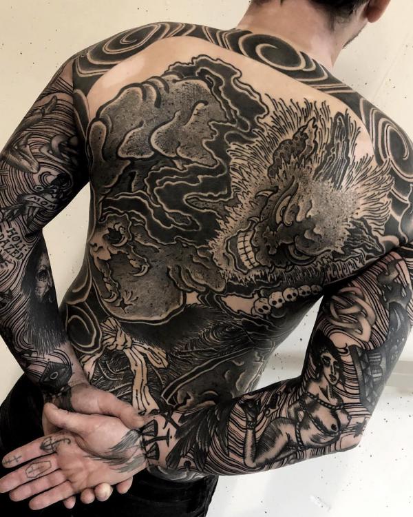 Black dragon full back tattoo