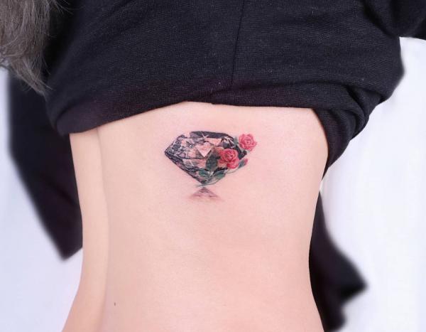 Diamond with rose side tattoo