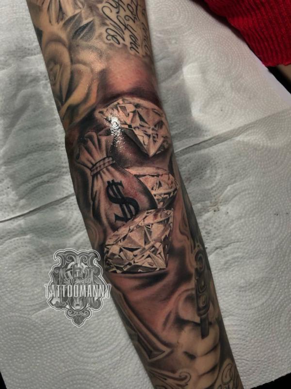 Diamond and money bag tattoo