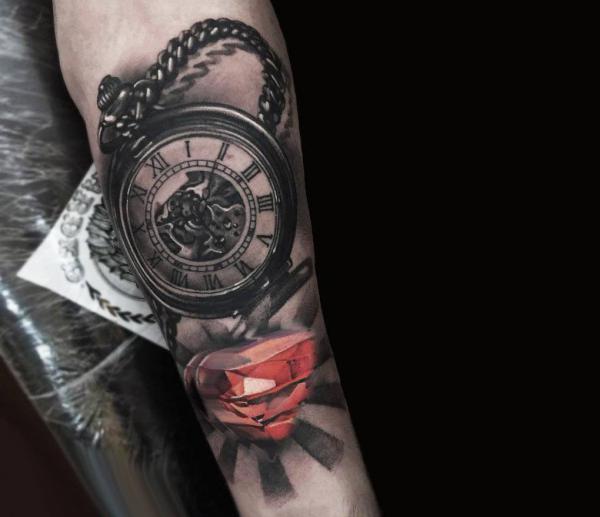 Diamond and watch tattoo