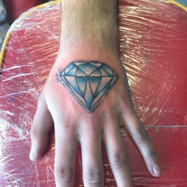 Diamond hand tattoo