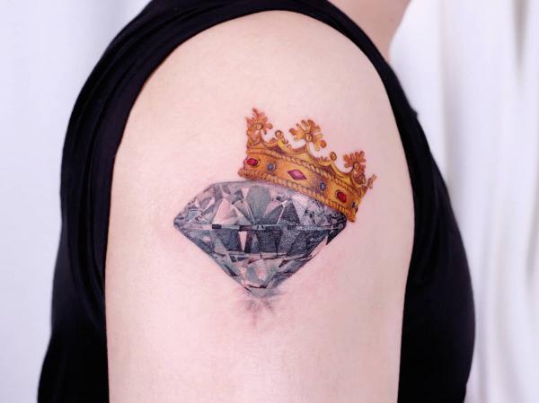 Diamond with crown tattoo